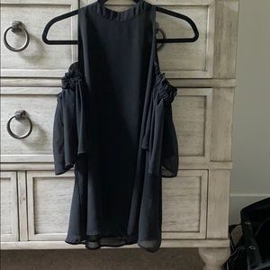 Off the shoulder, high neck blouse